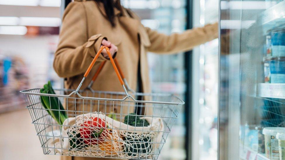 Woman with shopping basket