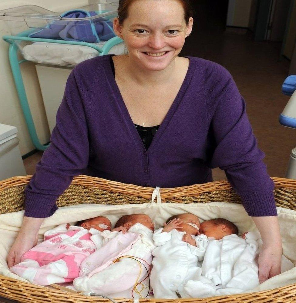 Lisa Kelly with her quadruplets at five days old