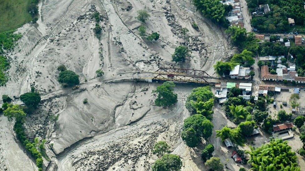 Image shows an aerial view of the mudslide