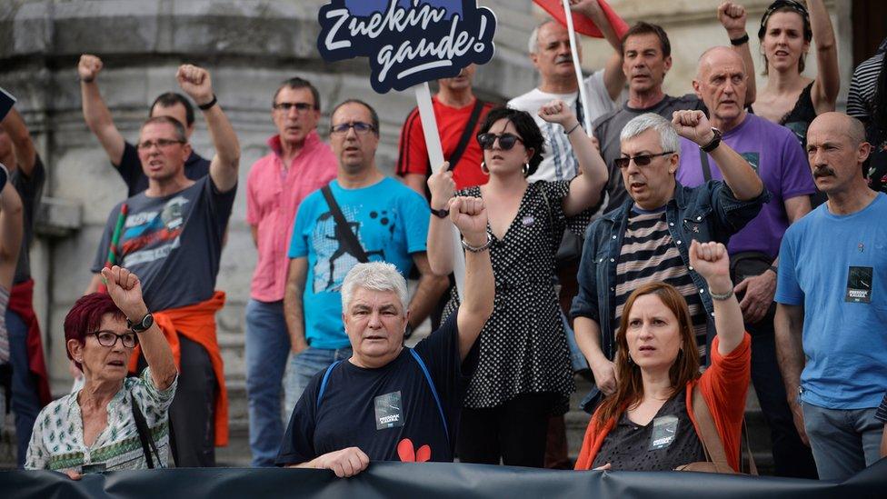 Former ETA member Anttxon Lopez Ruiz, alias "Kubati" (front, 2L) raises his fist during a rally in support of ETA prisoners in Bilbao, Spain, April 21, 201