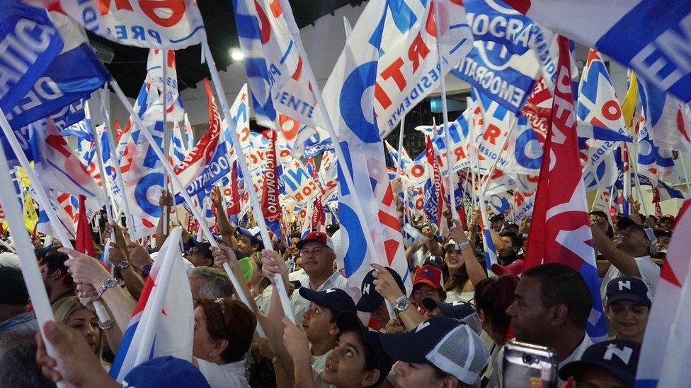 Supporters of Laurentino Cortizo celebrate at a rally