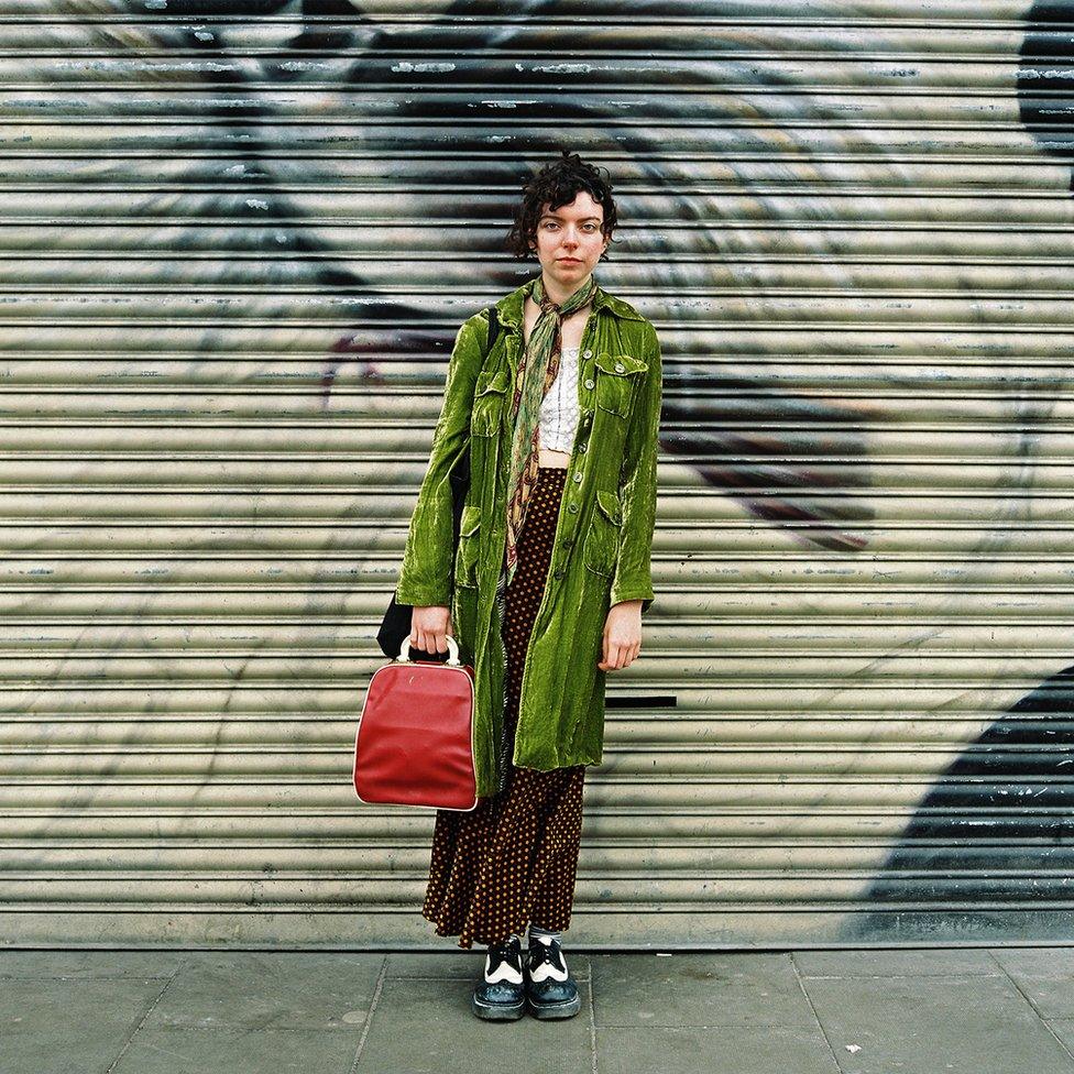 Woman in a green coat