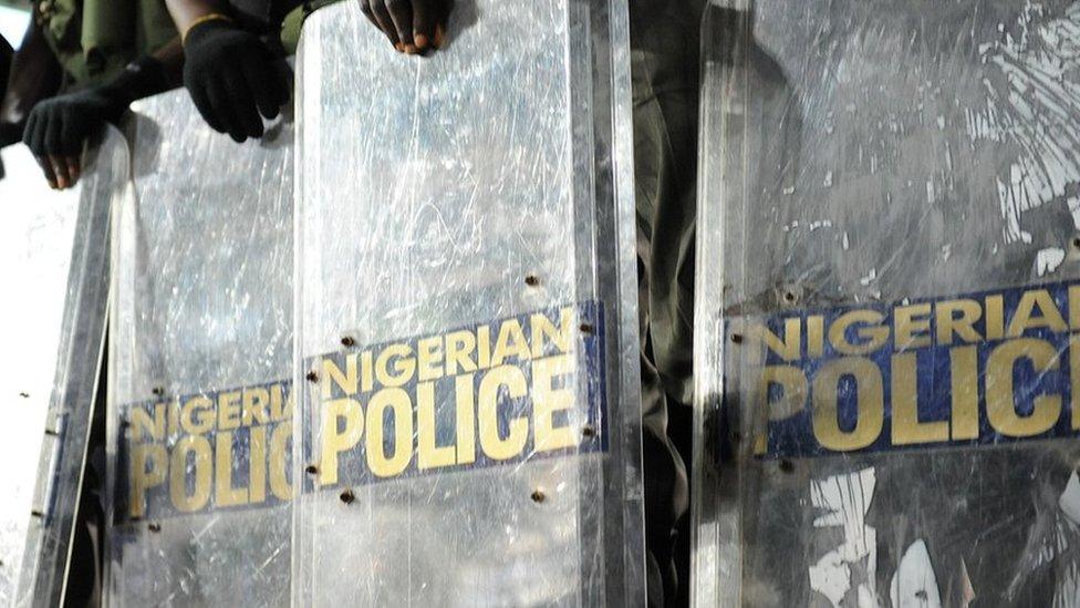 Policemen line during the presidential primaries of the ruling Peoples Democratic Party in Abuja in January 2011