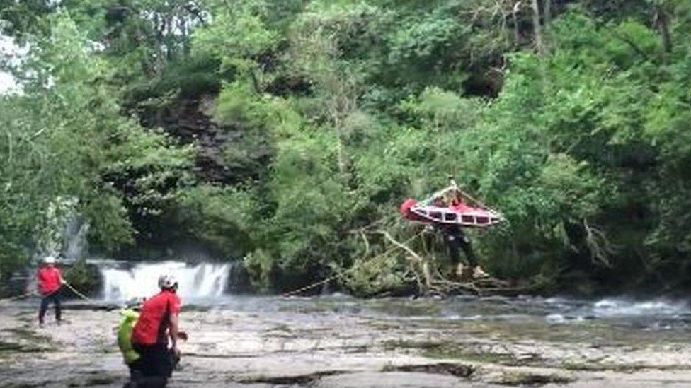 Western Beacons, Central Beacons and Brecon Mountain Recue teams winch a man out after a waterfall plunge