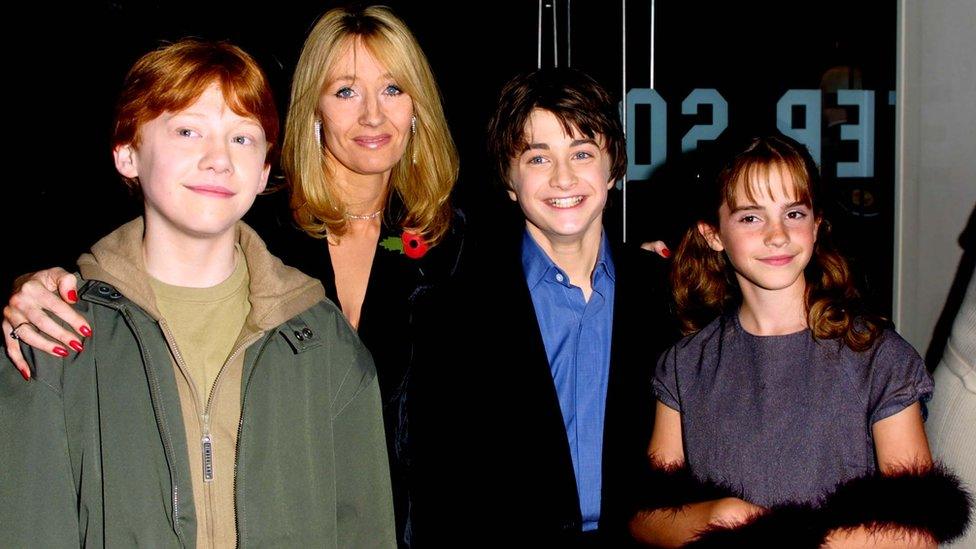 Rupert Grint (left), JK Rowling (centre), Daniel Radcliffe (centre) and Emma Watson (right) at the Harry Potter and the Philosopher's Stone premiere in 2001.