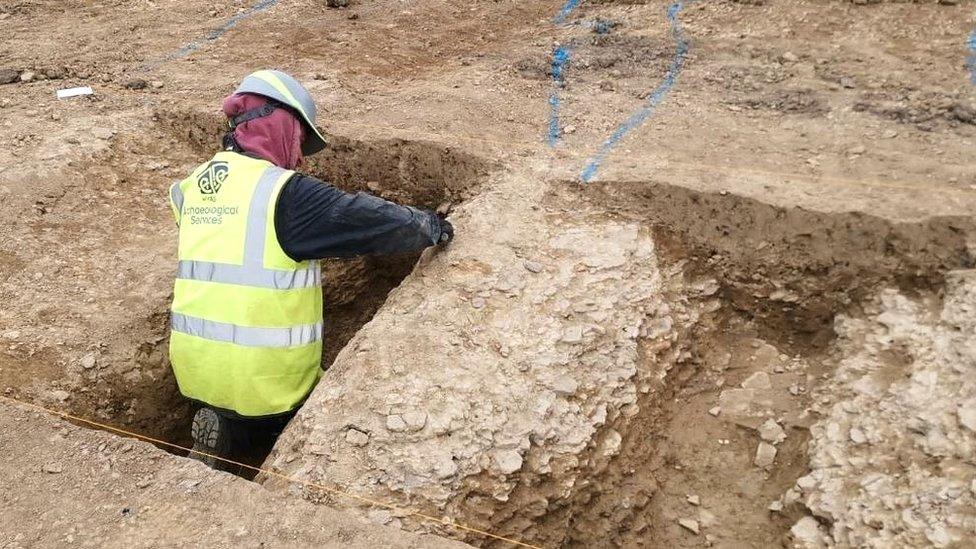 Archaeologist during a dig at Farm Lane, Fitzwilliam