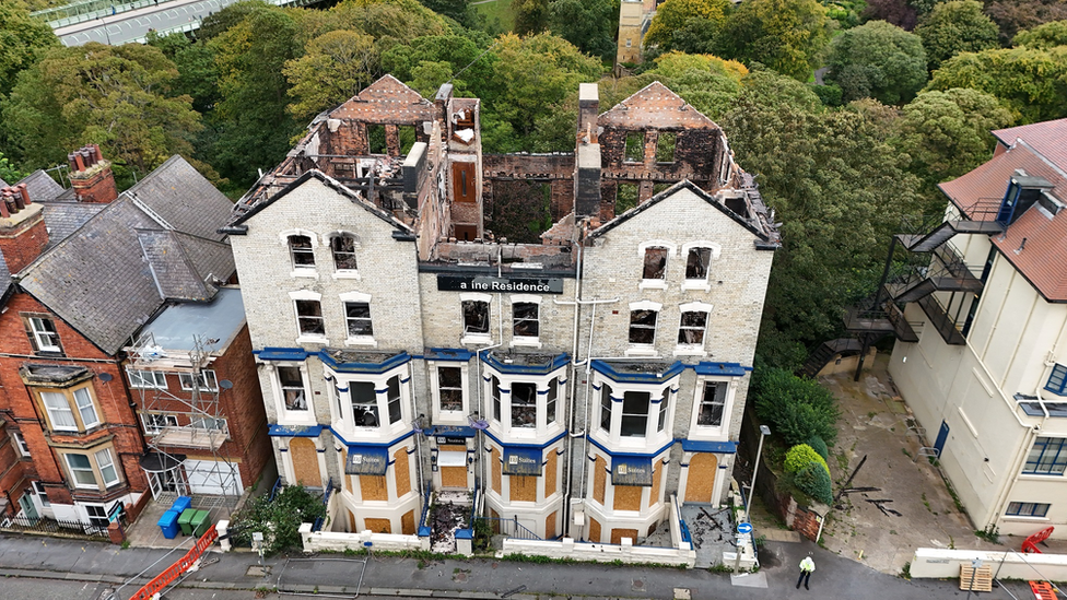 Aerial view of damaged Marine Residence Hotel