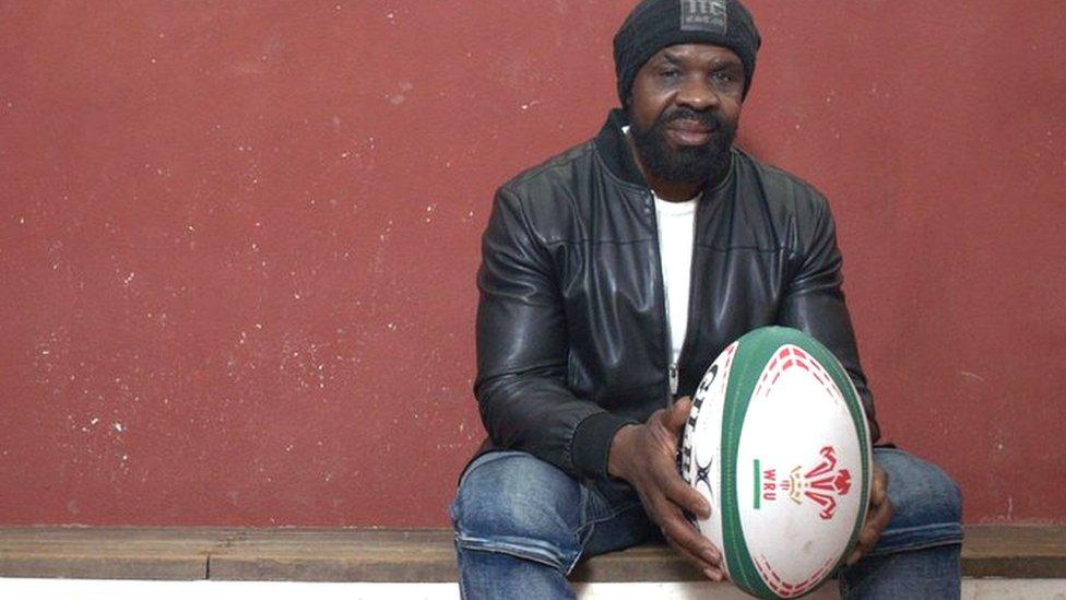 Glenn Webbe holding a rugby ball