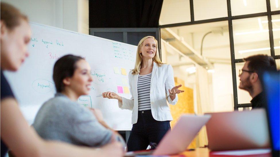 Woman giving presentation