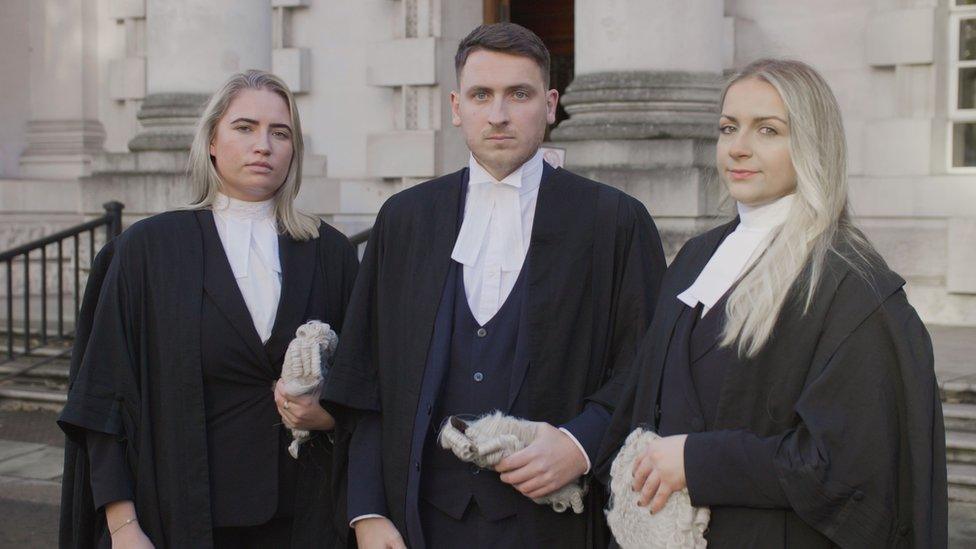 It shows barristers Aoife Marken, Thomas Thibodeau and Taryn Graham outside a courthouse