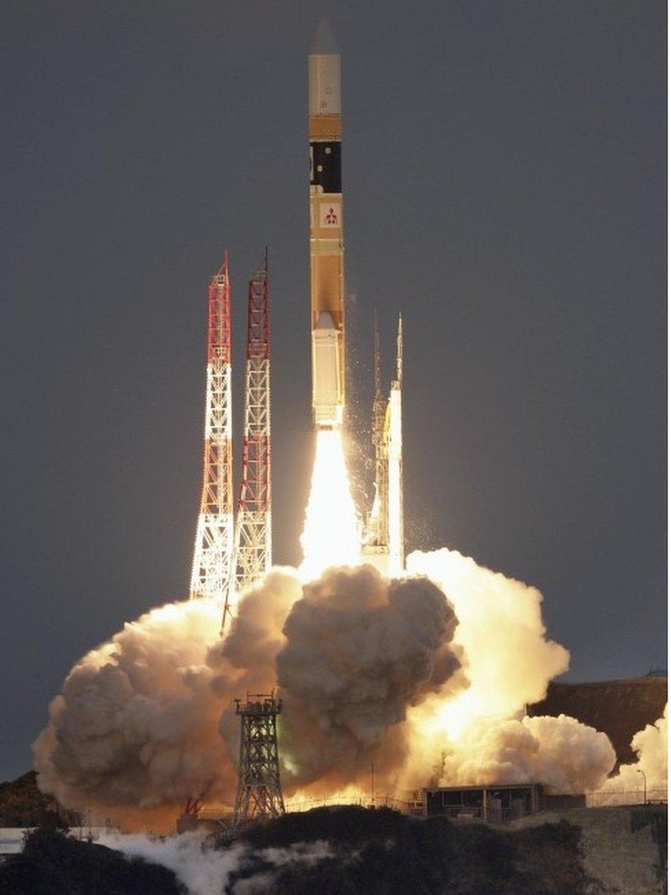 A H-IIA rocket, carrying X-ray astronomy satellite "ASTRO-H", lifts off from the launch pad at Tanegashima Space Center on the Japanese southwestern island of Tanegashima, in this photo taken by Kyodo February 17, 2016.