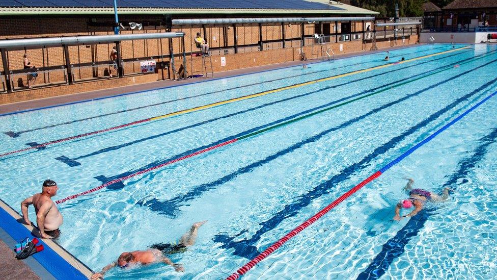 Swimmers enjoy the pool at Woodgreen Leisure Centre, Oxfordshire