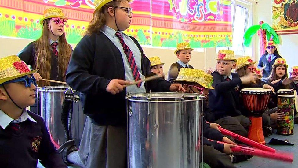 children playing drums