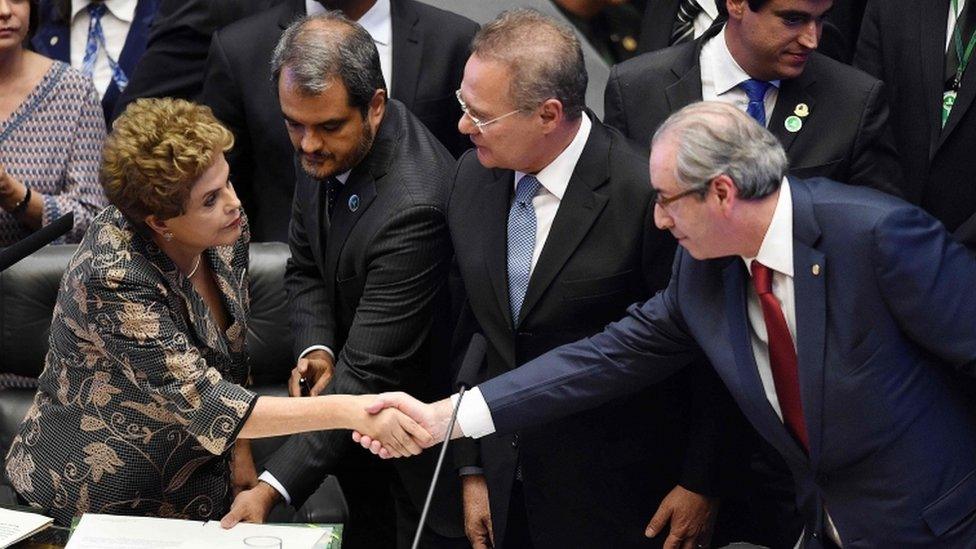 Dilma Rousseff and Eduardo shake hands ate the opening session of Congress, 2 February 2016