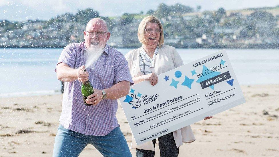 Jim and Pam Forbes celebrating their win