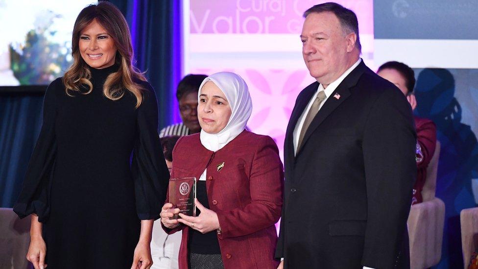 Amina Khoulani with Melania Trump and Mike Pompeo