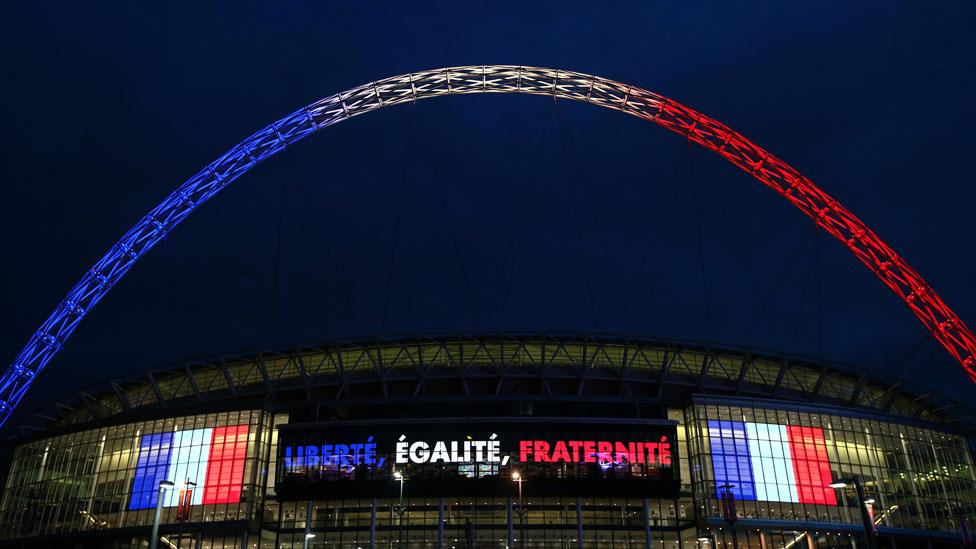 Wembley stadium is lit up in the French Tricolore in remembrance to the victims of last weeks terror attacks in Paris