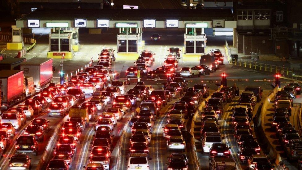 Vehicles queue up at the entrance of Port of Dover, ahead of travel restrictions between France and Britain, amid the coronavirus disease (COVID-19) pandemic, in Dover, Britain December 17, 2021