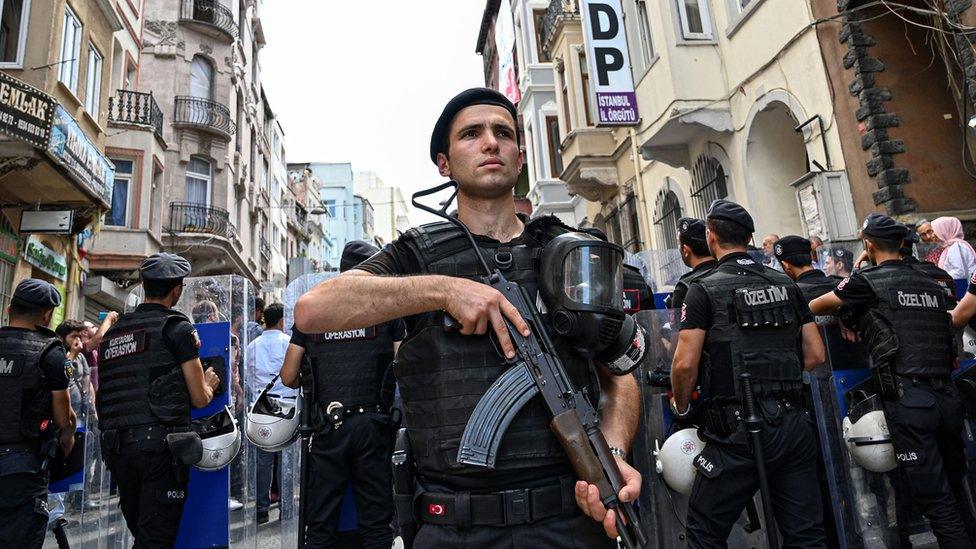 Turkish anti-riot police officers guard the headquarters of the pro-Kurdish Peoples' Democratic Party (HDP) in Istanbul, 19 August 2019