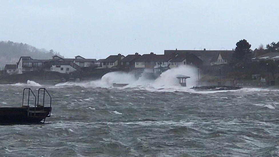 Large waves crashing on the shore at Deganwy