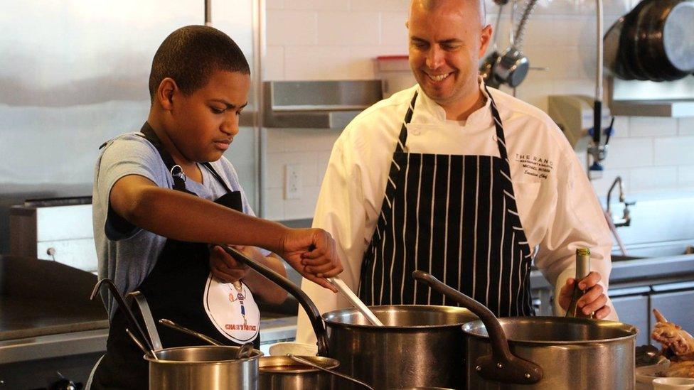 Chase Bailey cooking with another chef