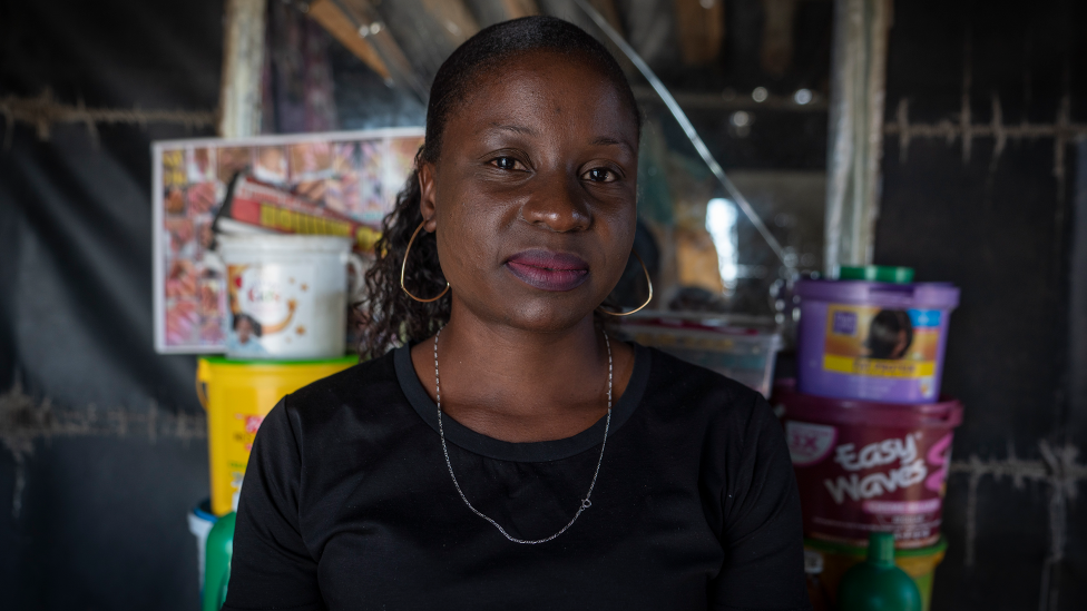 Nelfalda Dule in her hairdresser shack in Alexandra township - Johannesburg, South Africa