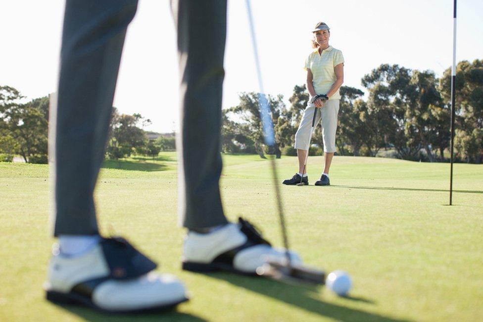 Stock image of golfers