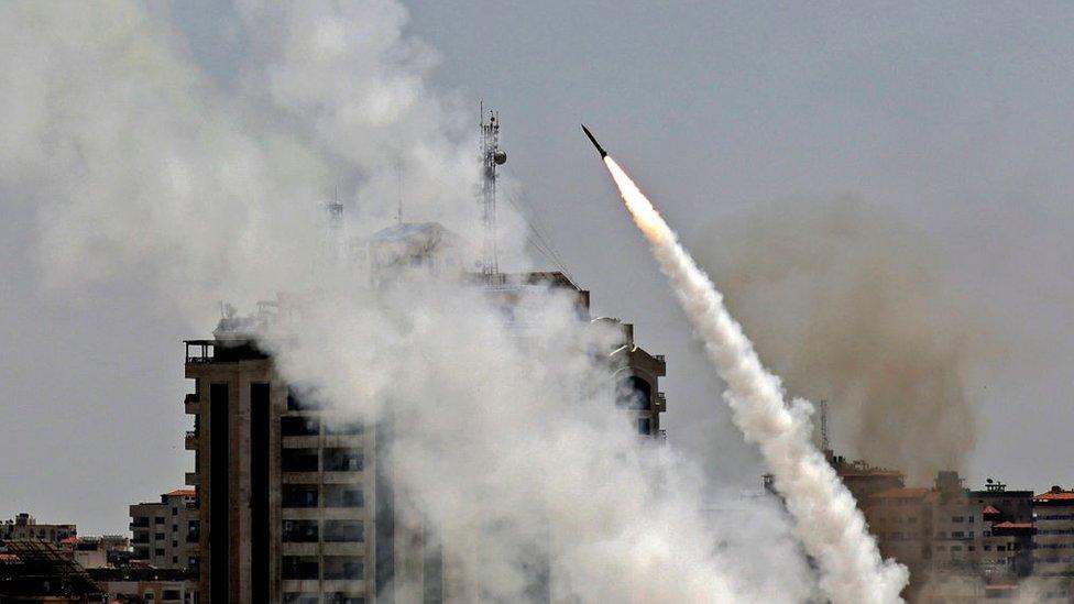 A rocket is fired by Palestinian militant from Gaza City towards Israel on 11 May 2021