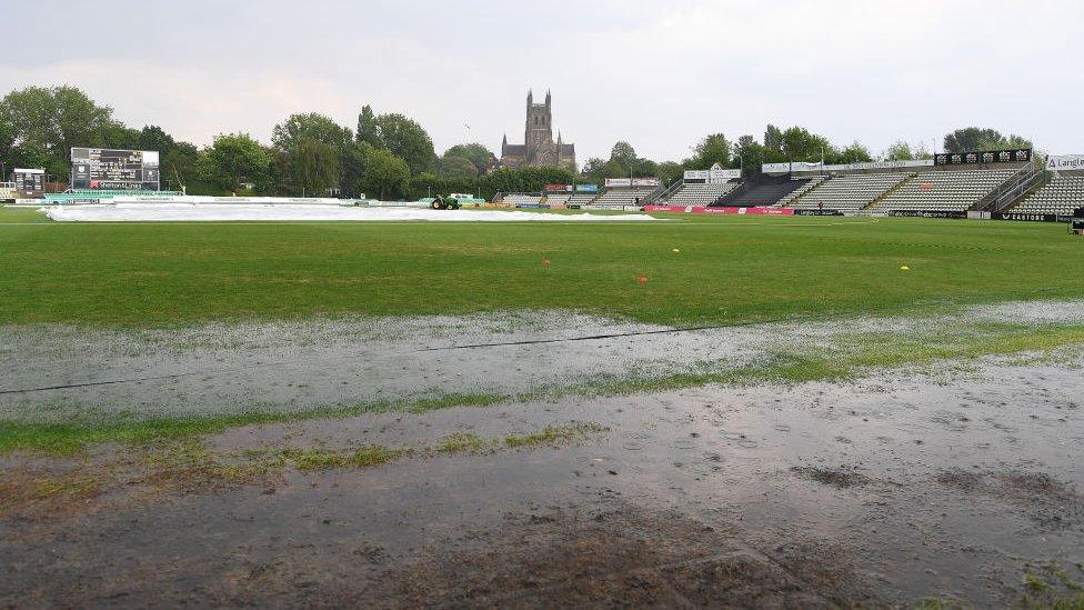 flooded cricket pitch