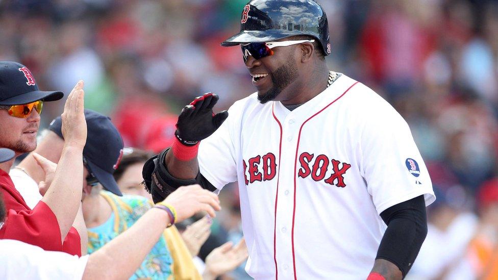 Boston Red Sox hitter David Ortiz celebrates his solo home in the sixth inning against the Toronto Blue Jays in a September 2013 file photo