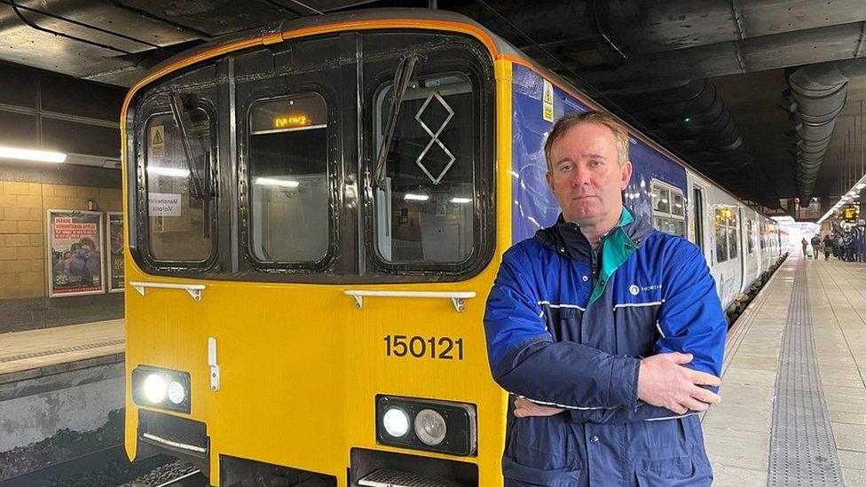 Ian Birch in front of train