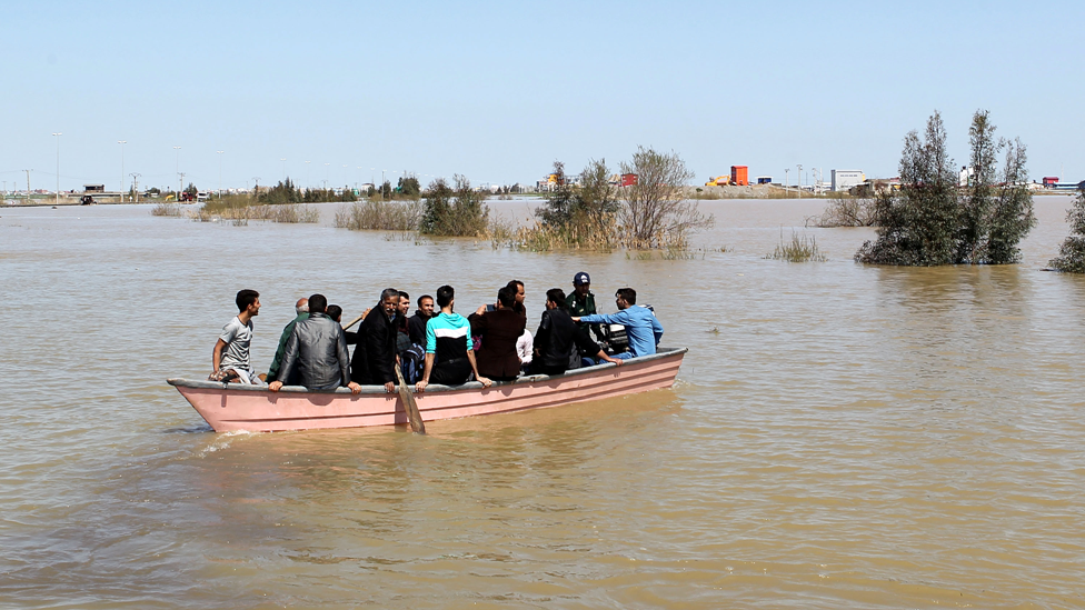 People in a boat in Golestan Province, Iran