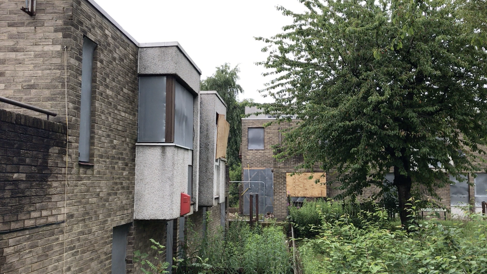 Boarded up homes at Clasper Village