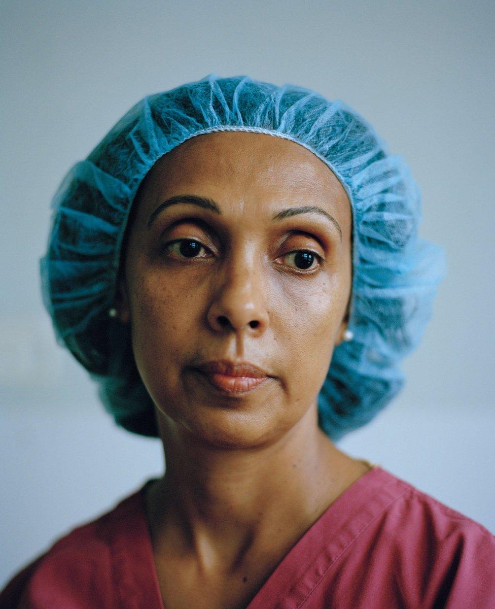 A lady with her hair in a hair net