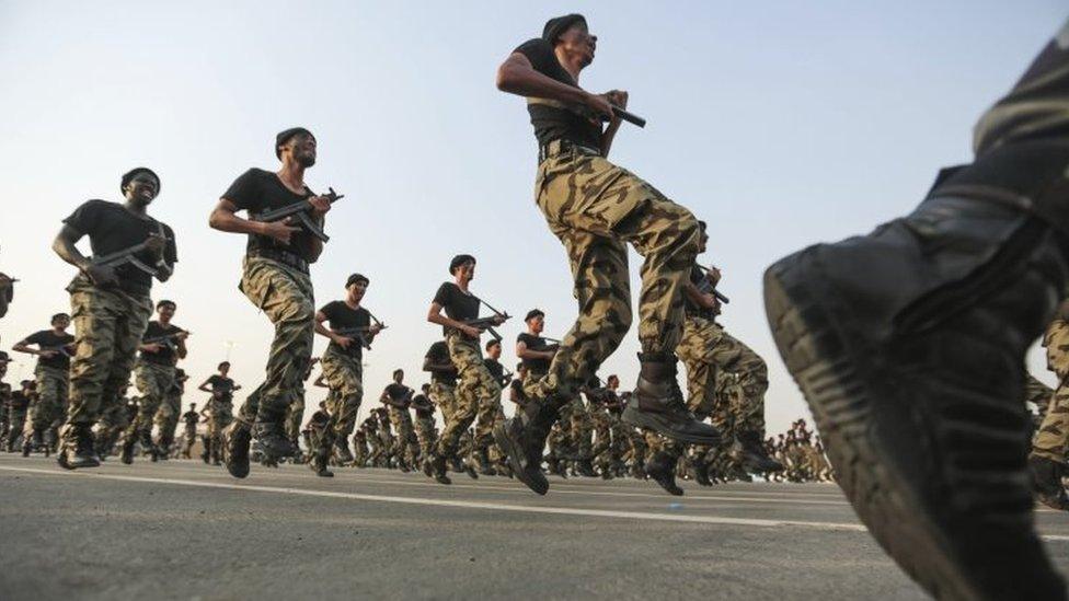 Saudi security forces take part in a military parade in preparation for the annual Hajj pilgrimage in Mecca (17 September 2015)