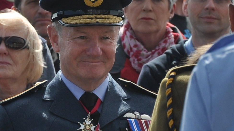 Lieutenant Governor Air Marshal Peter Walker inspecting the Liberation Day parade in 2014