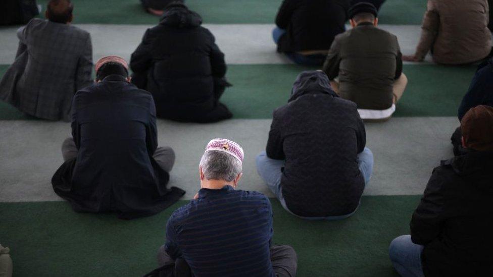 Worshippers at a mosque