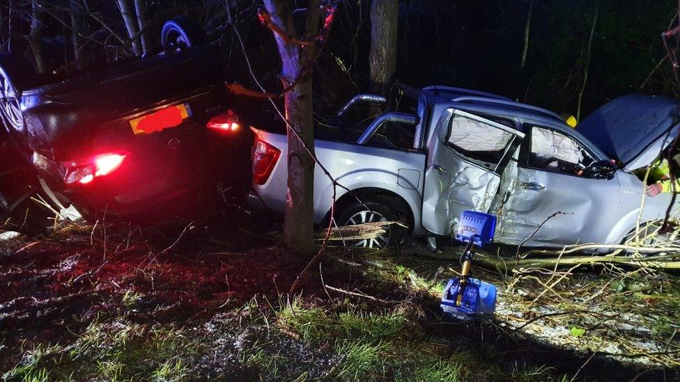 Car on roof and another on verge after M58 crash