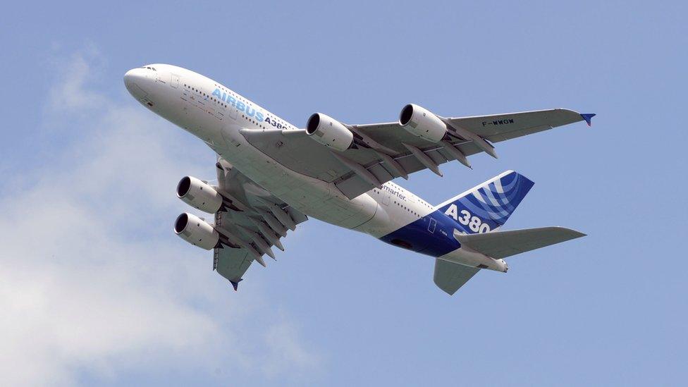 The Airbus A380 aircraft flies past during the second day of a flying display at the Singapore Airshow on February 20, 2008.