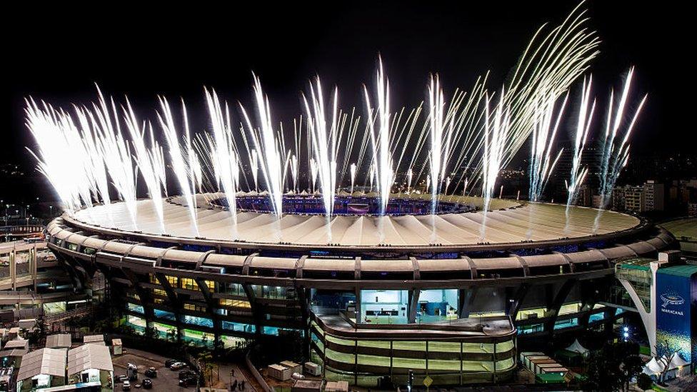 Fireworks explode above the Maracana stadium during the rehearsal of the opening ceremony of the Olympic Games