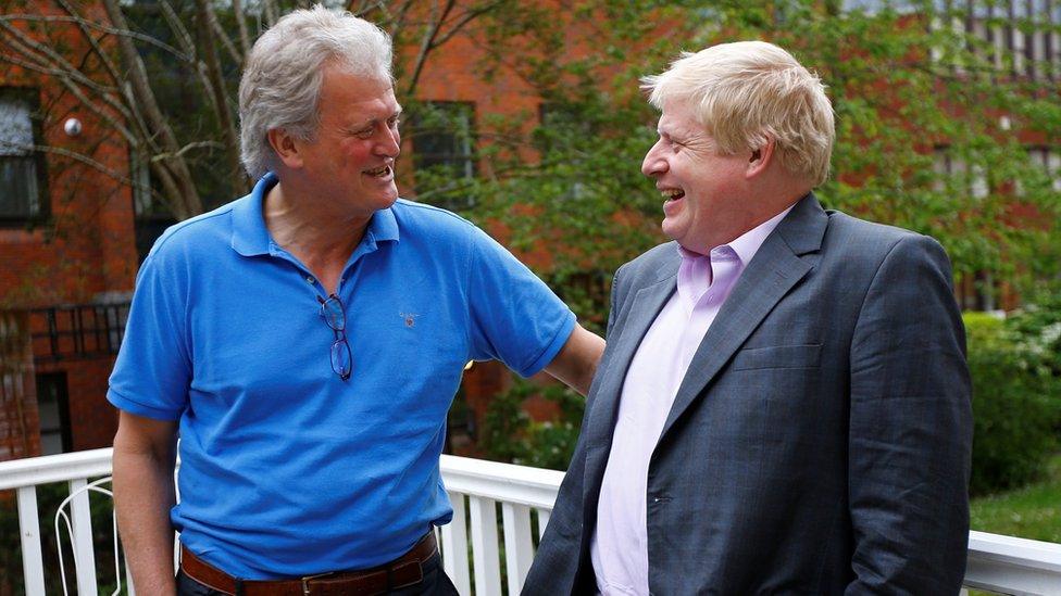 Boris Johnson (R) speaks with JD Wetherspoon chairman Tim Martin during a Vote Leave reception