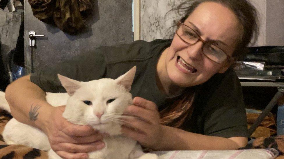 Icicle the cat and his owner Mandy Baker