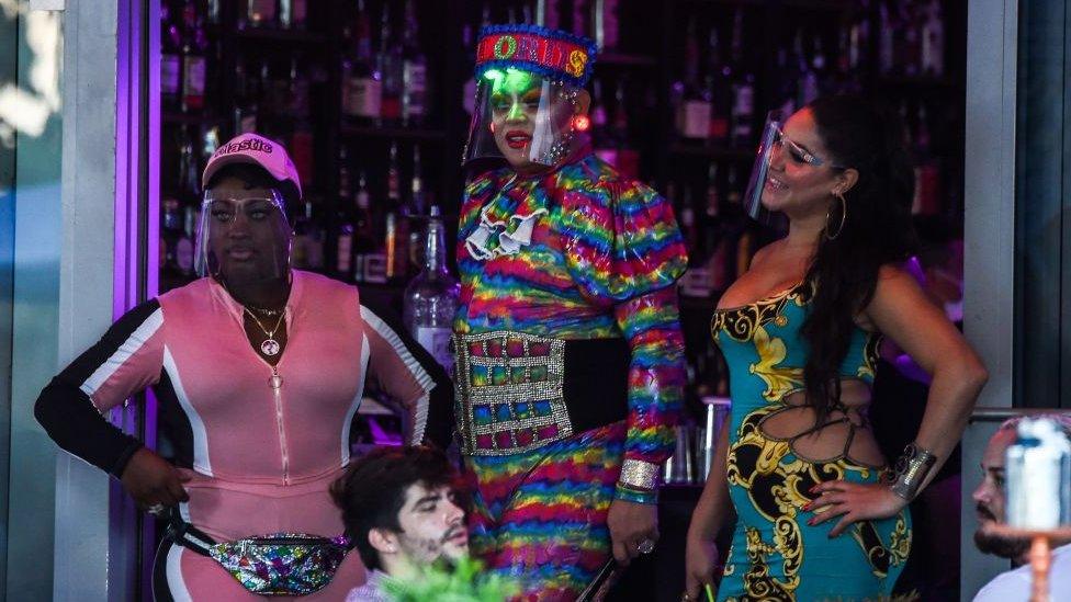 Professional drag performers wear face shields in Miami