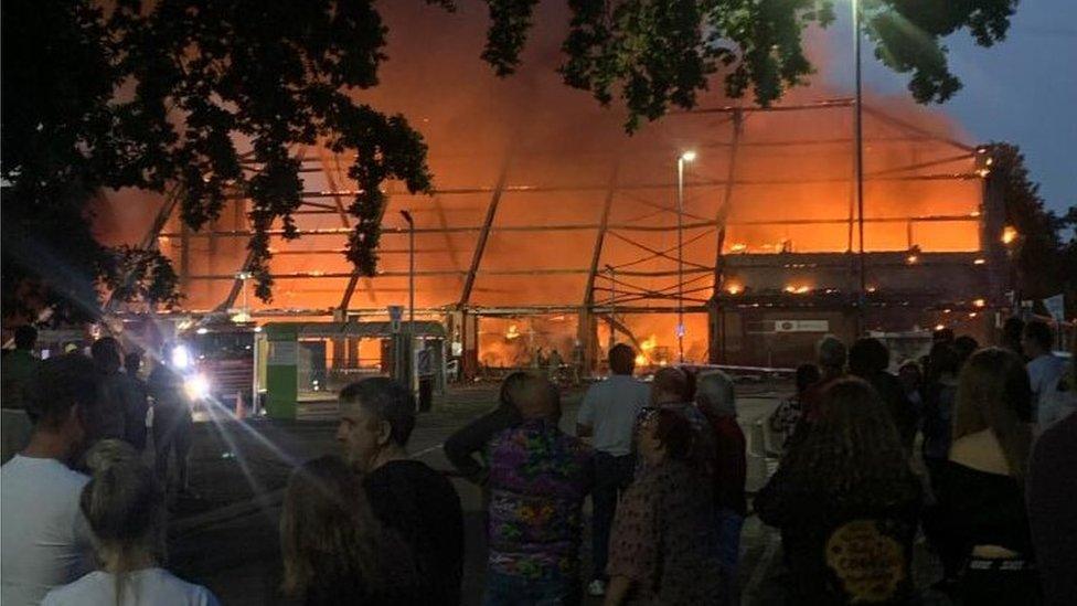 People watching fire at Budgens