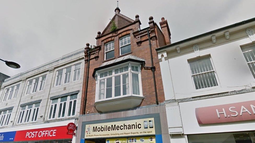 The building at 13 Regent Street is currently used as a phone shop below