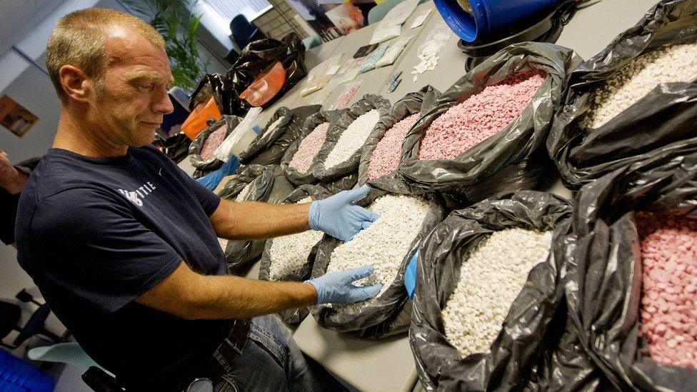 A lot of ecstasy tablets sold in the UK are made in the Netherlands, this is a police raid there