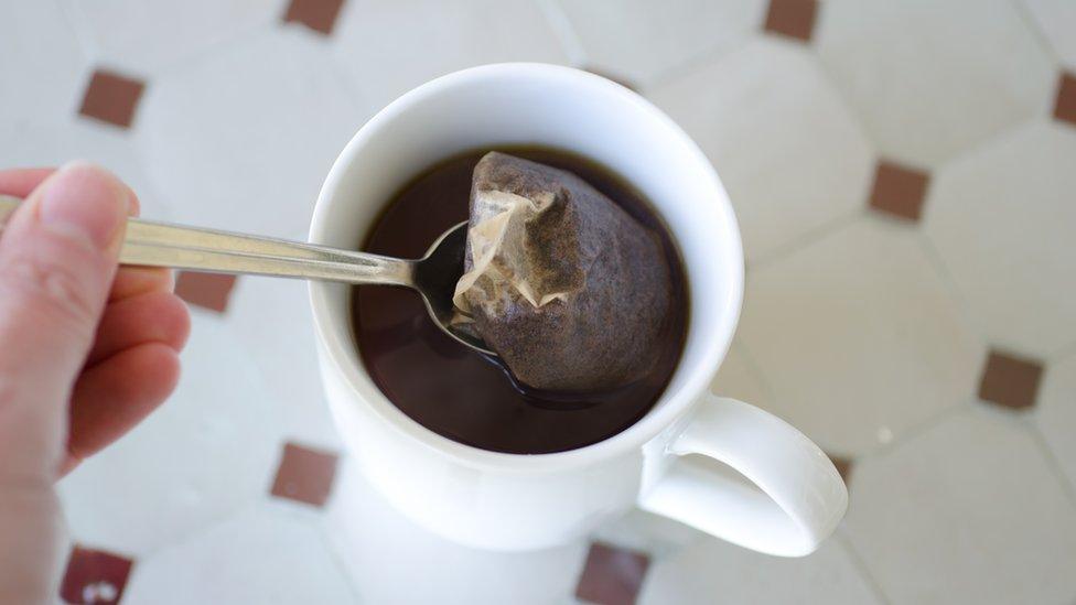 A tea bag in a mug