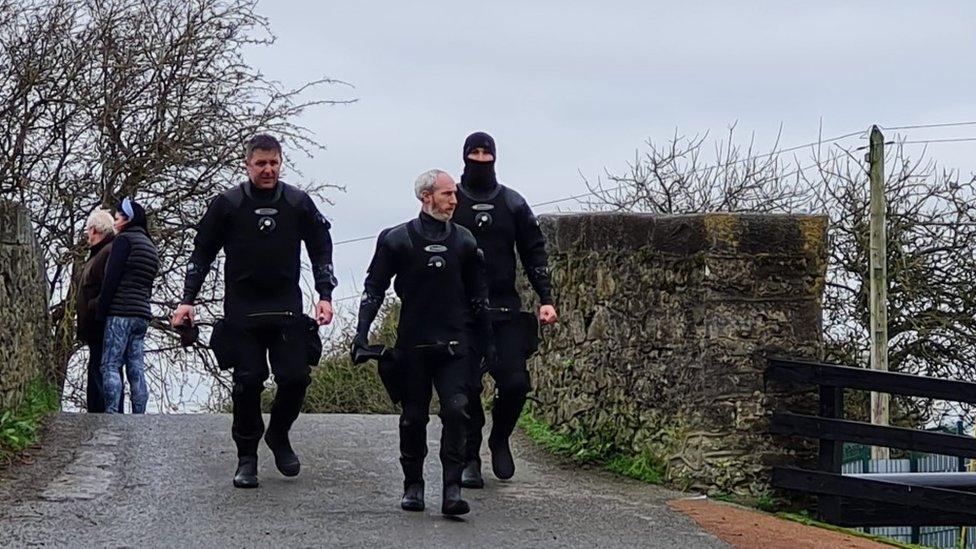 Police divers at the crime scene