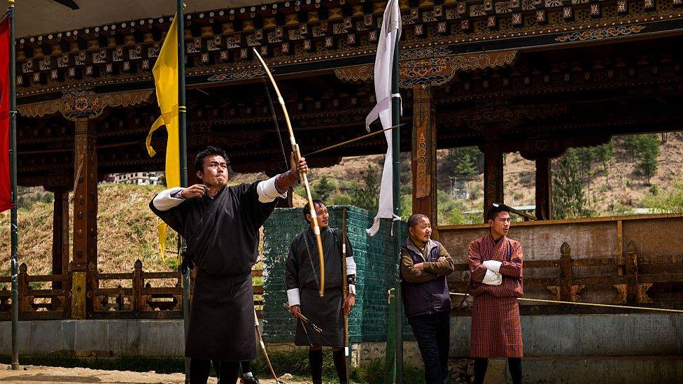 The local men practise their archery skills, taken in Bhutan, April 2016