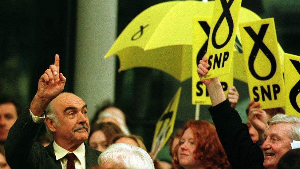 Sean Connery is given a standing ovation by the crowd as he enters the SNP congress